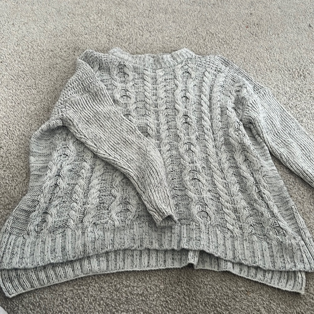 1. State size large white sweater